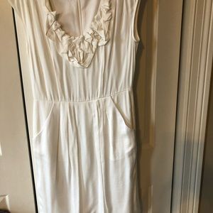 Beautiful off white dress with pocket.